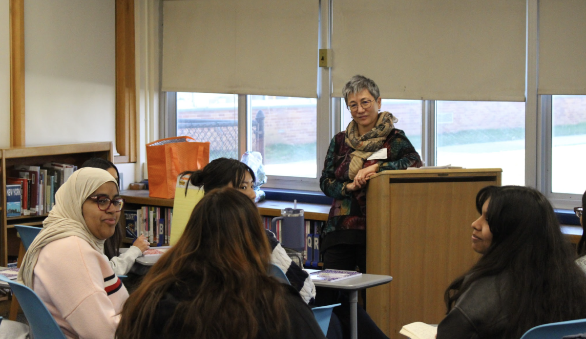 Students gather with poet and professor Kimiko Hahn for an interactive poetry workshop.